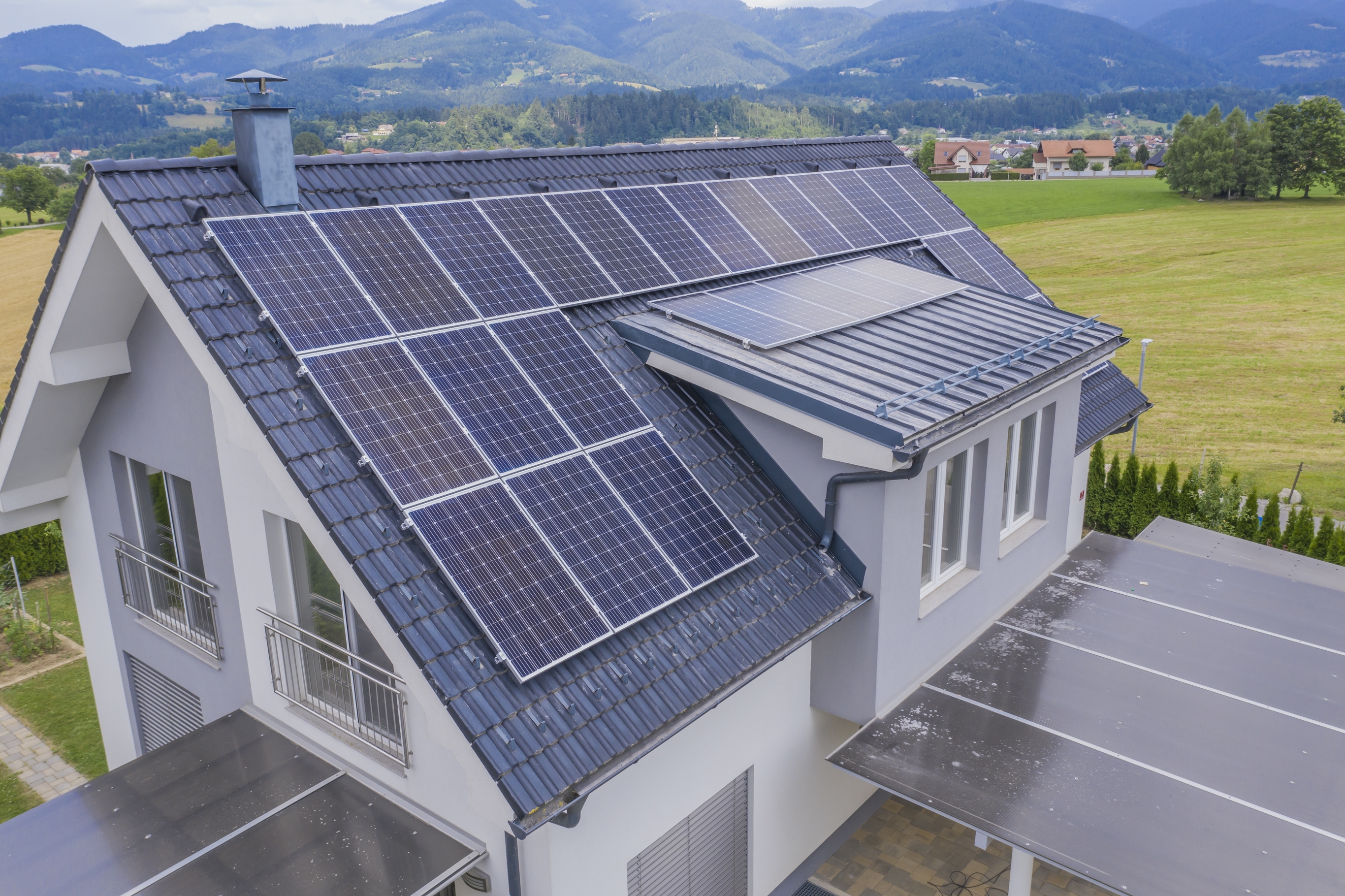 Are Solar Panels Worth Investing In? 5 aerial-view-private-house-with-solar-panels-roof.jpg